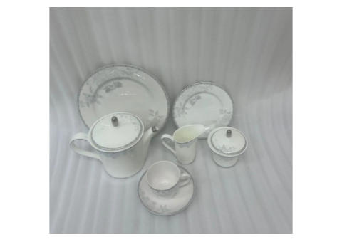 24-Piece Porcelain Tea Set: 9 Elegant Grey Floral Features - 1/3