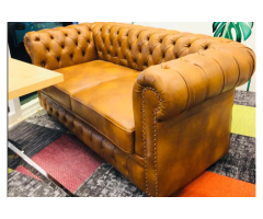 7 Regal Features of Chesterfield Leatherette Sofa for Luxury Spaces
