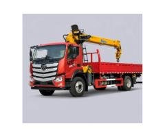 Truck-mounted crane transport vehicle